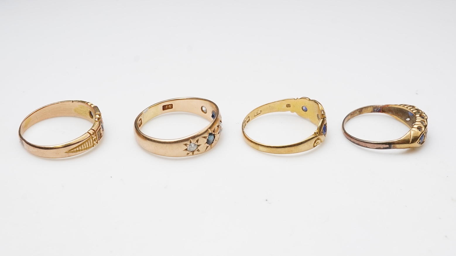 A group of four sapphire rings, late 19th/early 20th century